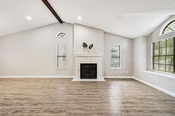 Empty room, Fireplace, Interior, Recessed Lighting, Wooden Beams, Wood Texture Flooring