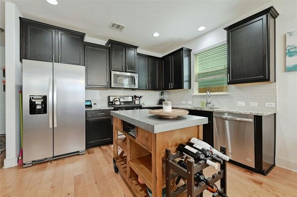 Interior, Kitchen, Recessed Lighting, Stainless Steel Appliances, Wood Texture Flooring