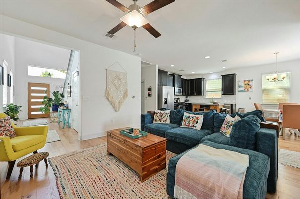 Chandelier, Dining room, Interior, Kitchen, Living room, Recessed Lighting, Stainless Steel Appliances, Wood Texture Flooring