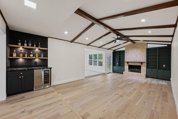 Empty room, Fireplace, Interior, Recessed Lighting, Stone Walls, Wooden Beams, Wood Texture Flooring