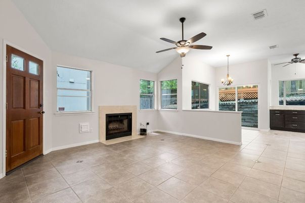 Chandelier, Empty room, Fireplace, Interior