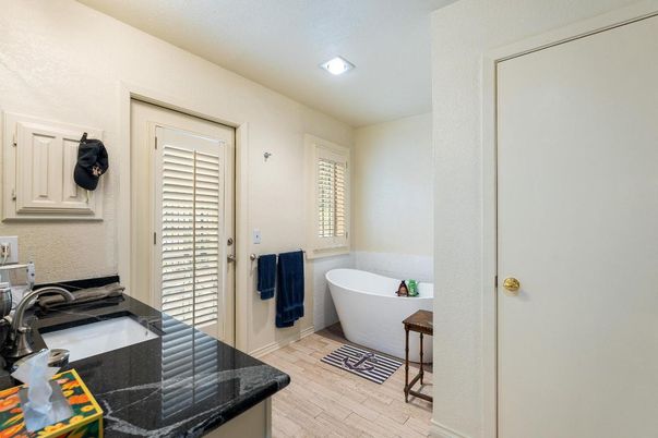 Bathroom, Free Standing Baths, Interior, Recessed Lighting, Wood Texture Flooring