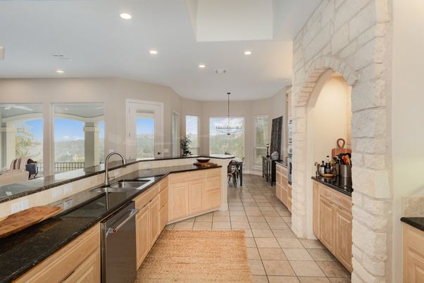 Interior, Kitchen, Pendant Lights, Recessed Lighting, Stainless Steel Appliances, Stone Walls