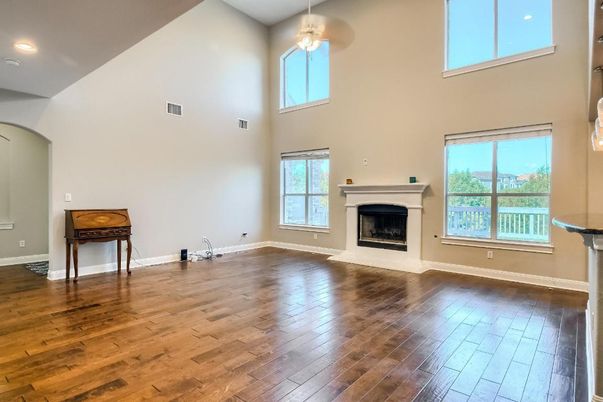 Fireplace, Interior, Pendant Lights, Recessed Lighting, Wood Texture Flooring