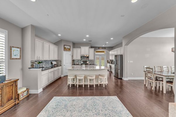 Dining room, Interior, Kitchen, Recessed Lighting, Stainless Steel Appliances, Wood Texture Flooring