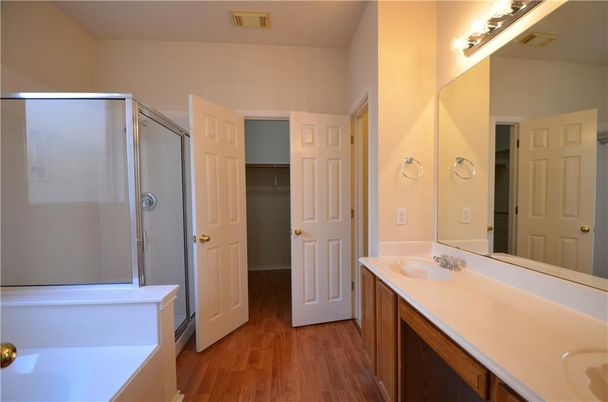 Bathroom, Dual Sink Vanities, Glass Shower, Interior, Wood Texture Flooring