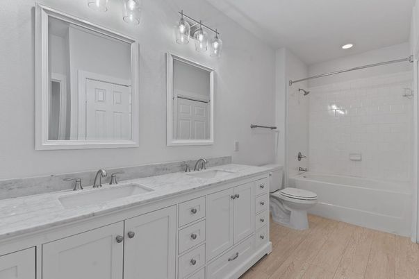 Bathroom, Dual Sink Vanities, Interior, Recessed Lighting, Wood Texture Flooring