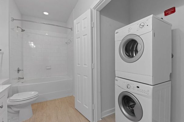 Bathroom, Interior, Recessed Lighting, Utility Closets, Washer, Wood Texture Flooring