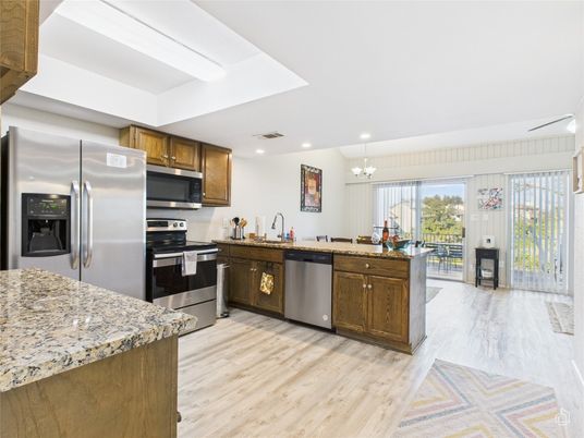 Chandelier, Interior, Kitchen, Pendant Lights, Recessed Lighting, Stainless Steel Appliances, Wood Texture Flooring