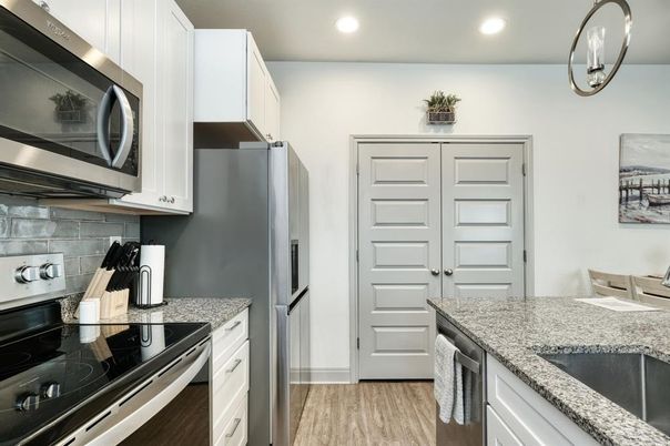 Interior, Kitchen, Recessed Lighting, Stainless Steel Appliances, Wood Texture Flooring
