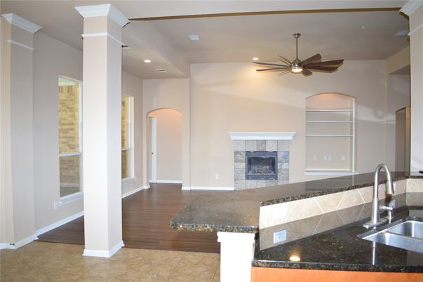 Fireplace, Interior, Kitchen, Recessed Lighting, Wood Texture Flooring