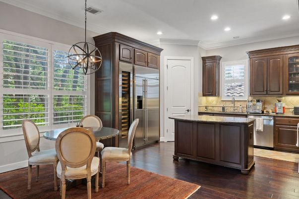 Dining room, Interior, Kitchen, Pendant Lights, Recessed Lighting, Stainless Steel Appliances, Wood Texture Flooring