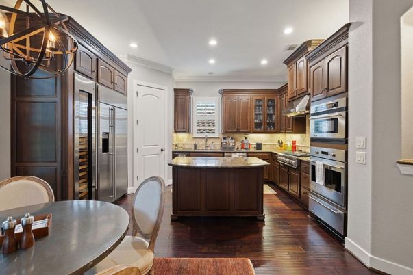 Dining room, Interior, Kitchen, Recessed Lighting, Stainless Steel Appliances, Wood Texture Flooring