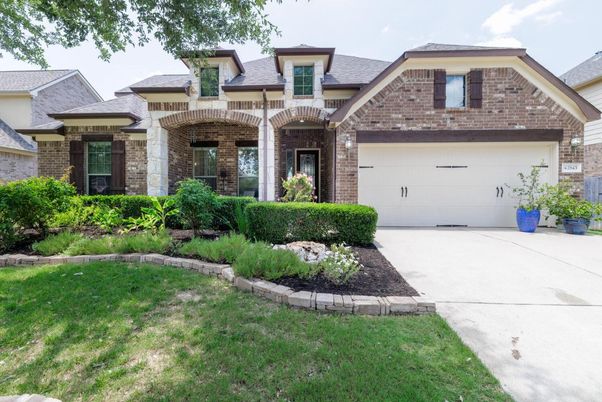 Attached, Exterior, Facade, Brick Facade, Brick Traditional