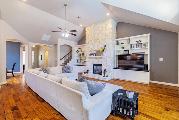 Fireplace, Interior, Living room, Recessed Lighting, Stone Walls, Wood Texture Flooring