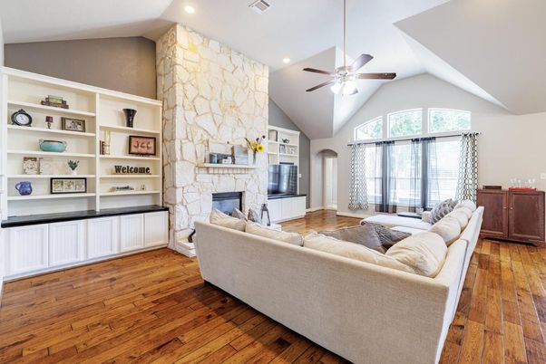 Fireplace, Interior, Living room, Recessed Lighting, Stone Walls, Wood Texture Flooring