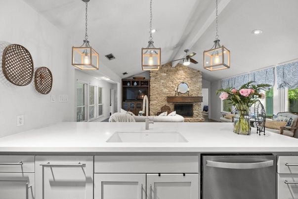Fireplace, Interior, Kitchen, Pendant Lights, Recessed Lighting, Stainless Steel Appliances, Stone Walls