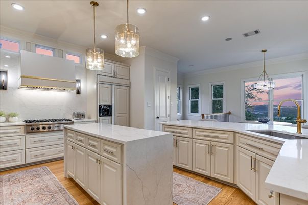 Interior, Kitchen, Marble Walls, Pendant Lights, Recessed Lighting, Stainless Steel Appliances, Wood Texture Flooring