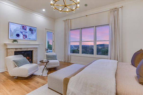 Bedroom, Chandelier, Fireplace, Interior, Recessed Lighting, Wood Texture Flooring