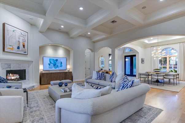 Chandelier, Dining room, Fireplace, Interior, Living room, Pendant Lights, Recessed Lighting, Wood Texture Flooring