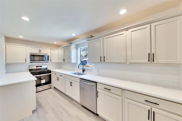 Interior, Kitchen, Recessed Lighting, Stainless Steel Appliances, Wood Texture Flooring