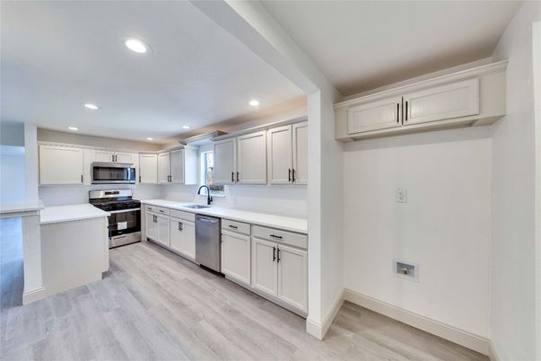 Interior, Kitchen, Recessed Lighting, Stainless Steel Appliances, Wood Texture Flooring
