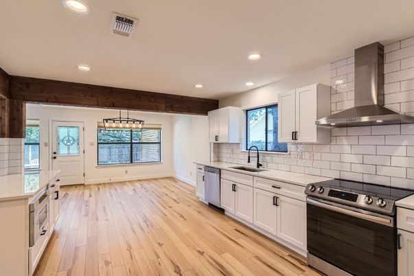 Interior, Kitchen, Pendant Lights, Recessed Lighting, Stainless Steel Appliances, Wood Texture Flooring
