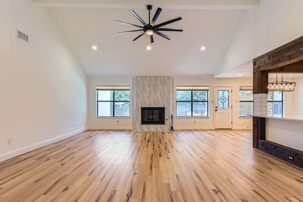 Empty room, Fireplace, Interior, Pendant Lights, Recessed Lighting, Wood Texture Flooring