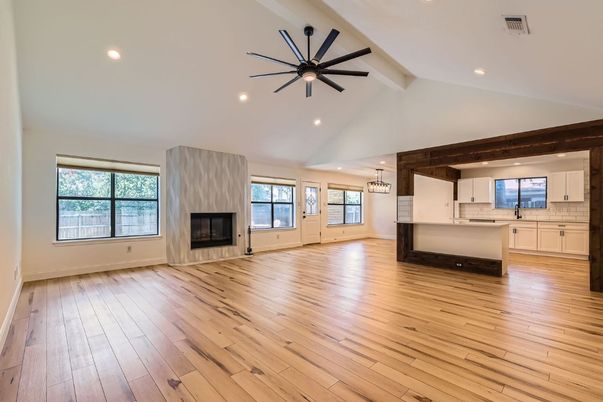 Chandelier, Empty room, Fireplace, Interior, Kitchen, Pendant Lights, Recessed Lighting, Wood Texture Flooring