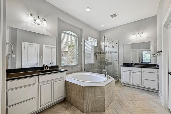 Bathroom, Dual Sink Vanities, Glass Shower, Interior, Recessed Lighting, Wood Texture Flooring