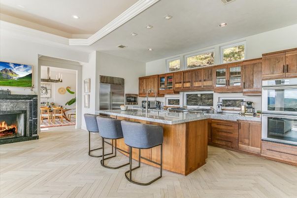 Fireplace, Interior, Kitchen, Recessed Lighting, Stainless Steel Appliances, Wood Texture Flooring