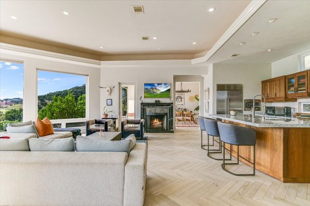Fireplace, Interior, Kitchen, Living room, Recessed Lighting, Stainless Steel Appliances, Wood Texture Flooring