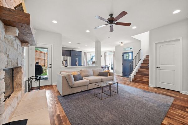 Fireplace, Interior, Kitchen, Living room, Recessed Lighting, Stone Walls, Wood Texture Flooring
