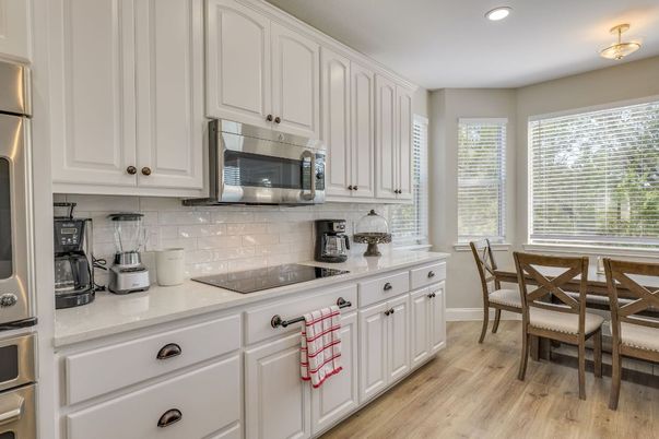 Dining room, Interior, Kitchen, Recessed Lighting, Stainless Steel Appliances, Wood Texture Flooring