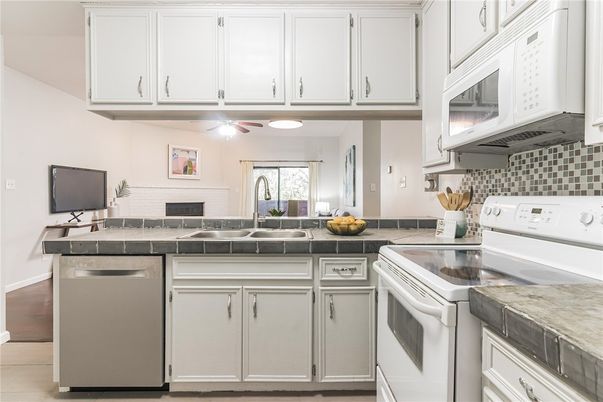 Interior, Kitchen, Tile Countertops, Wood Texture Flooring