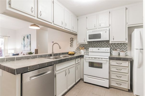 Interior, Kitchen, Tile Countertops, Wood Texture Flooring