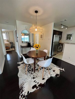 Dining room, Interior, Kitchen, Pendant Lights, Stainless Steel Appliances, Wood Texture Flooring