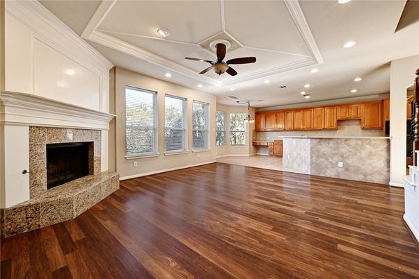 Empty room, Fireplace, Interior, Kitchen, Recessed Lighting, Wood Texture Flooring