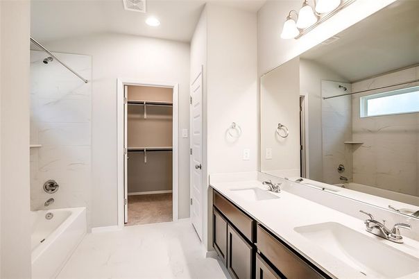 Bathroom, Dual Sink Vanities, Interior, Marble, Marble Walls, Recessed Lighting, Walk-in Closets