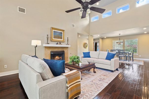 Dining room, Fireplace, Interior, Living room, Pendant Lights, Recessed Lighting, Wood Texture Flooring