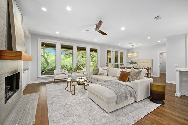 Chandelier, Dining room, Fireplace, Interior, Living room, Pendant Lights, Recessed Lighting, Wood Texture Flooring
