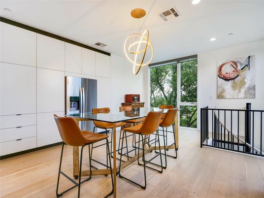 Dining room, Interior, Kitchen, Pendant Lights, Recessed Lighting, Stainless Steel Appliances, Wood Texture Flooring