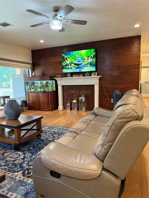 Home Theatre Room, Fireplace, Interior, Living room, Recessed Lighting, Wood Texture Flooring, Wooden Walls