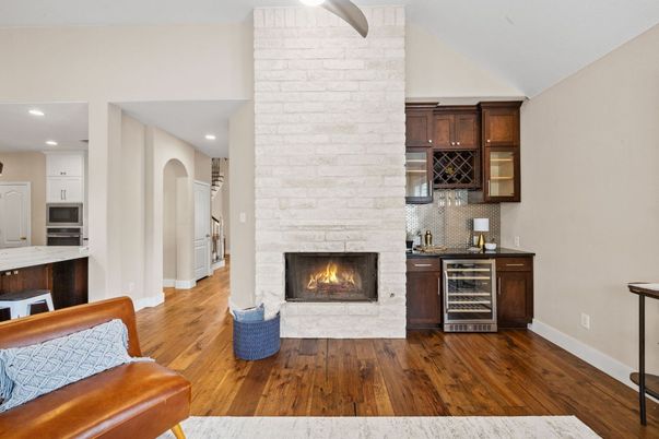 Fireplace, Interior, Kitchen, Recessed Lighting, Stone Walls, Wood Texture Flooring