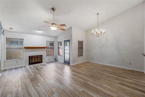 Chandelier, Empty room, Fireplace, Interior, Wood Texture Flooring