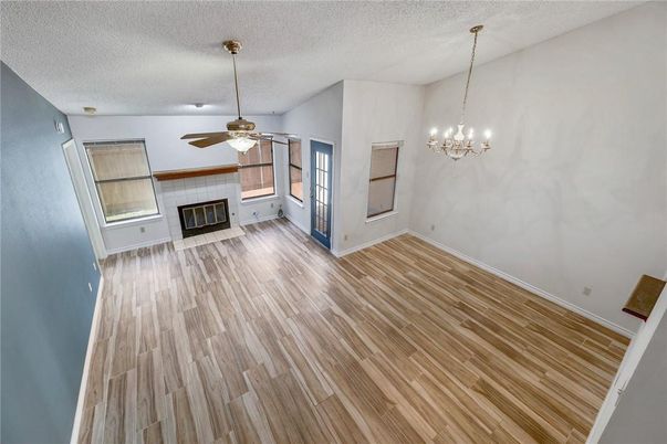 Empty room, Fireplace, Interior, Pendant Lights, Wood Texture Flooring