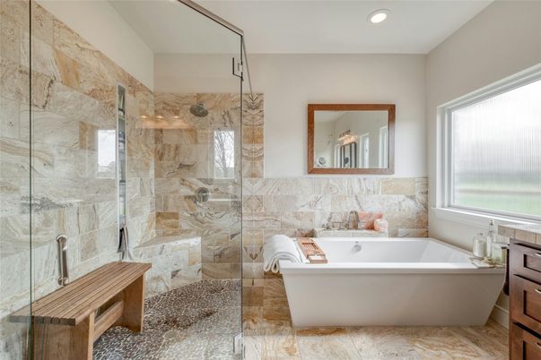 Bathroom, Free Standing Baths, Glass Shower, Interior, Recessed Lighting, Stone Walls
