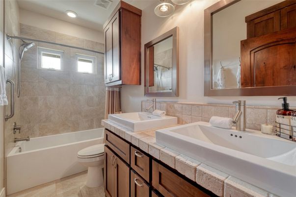 Bathroom, Dual Sink Vanities, Interior, Recessed Lighting, Tile Countertops
