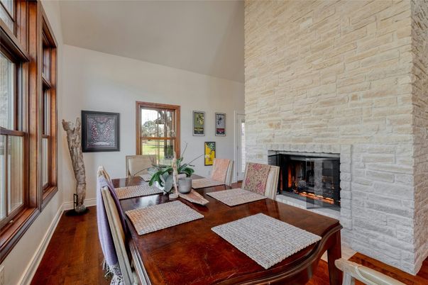 Dining room, Fireplace, Interior, Stone Walls, Wood Texture Flooring