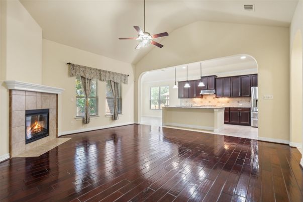 Empty room, Fireplace, Interior, Kitchen, Pendant Lights, Recessed Lighting, Wood Texture Flooring